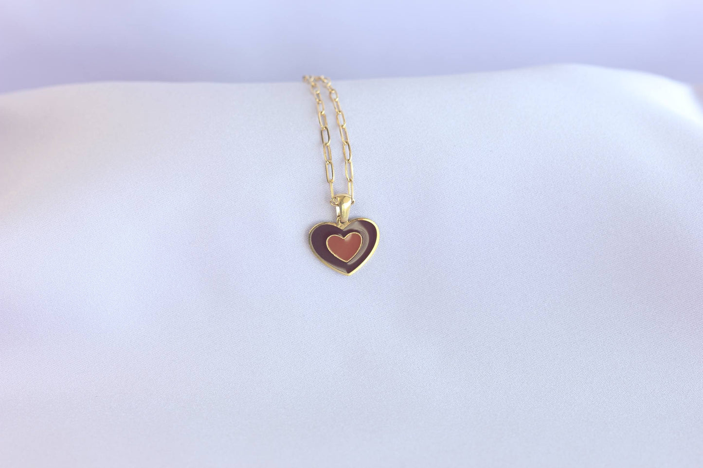 Brighten up your outfit with our Colorful Heart Pendant Chain Necklaces! Whether you're dressing up for a special event or adding a pop of color to your everyday look, this necklace offers dainty and colorful style. Perfect gift for her.