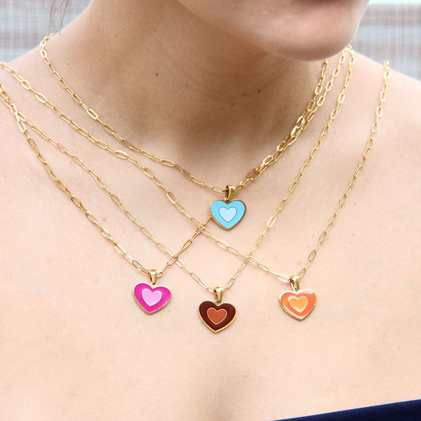 Brighten up your outfit with our Colorful Heart Pendant Chain Necklaces! Whether you're dressing up for a special event or adding a pop of color to your everyday look, this necklace offers dainty and colorful style. Perfect gift for her.