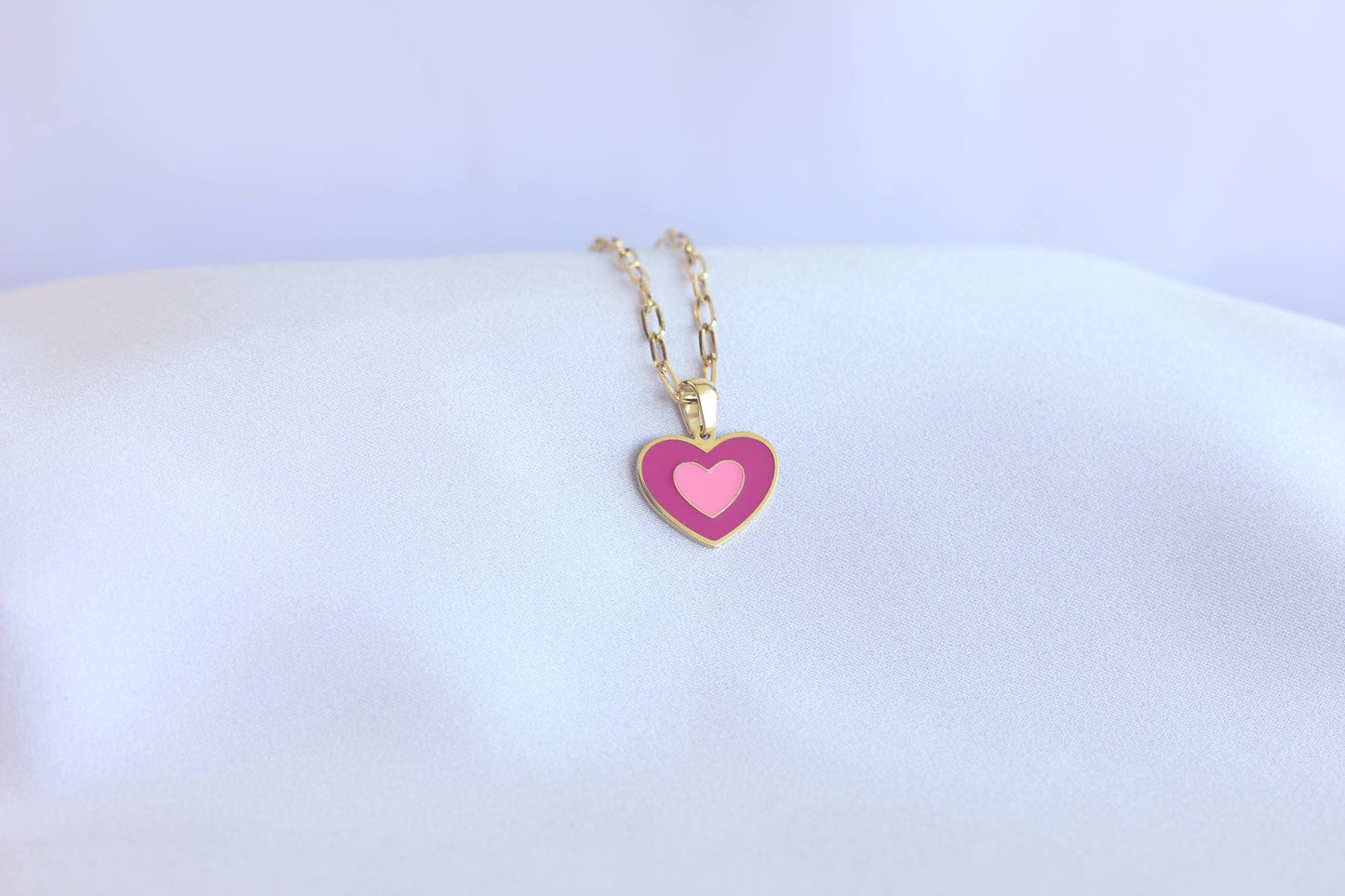 Brighten up your outfit with our Colorful Heart Pendant Chain Necklaces! Whether you're dressing up for a special event or adding a pop of color to your everyday look, this necklace offers dainty and colorful style. Perfect gift for her.