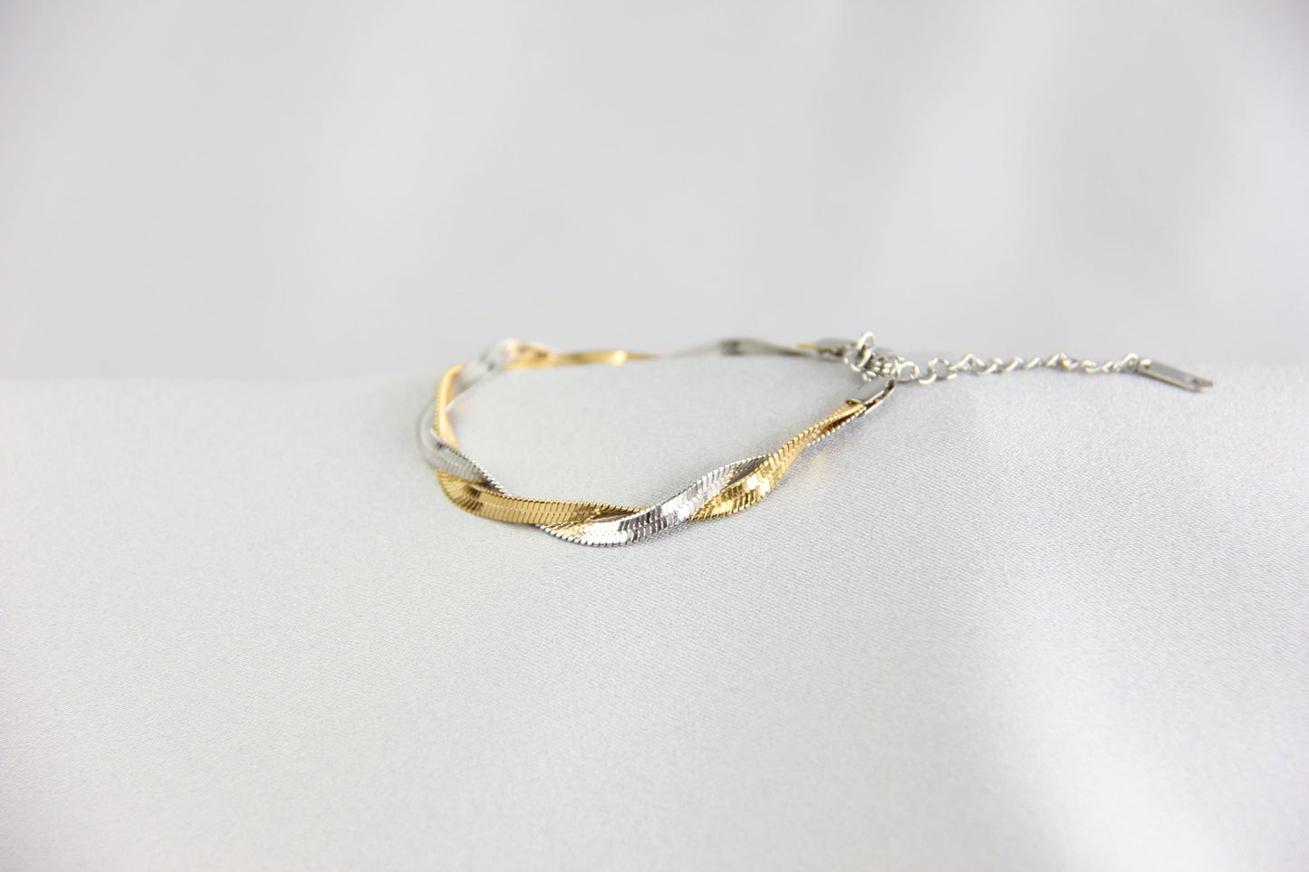 Unique Duo Color Braided Herringbone Twist Gold Chain Bracelet that reflects both minimalist and statement textures. Complete your special occasion outfit or night style with this beauty!