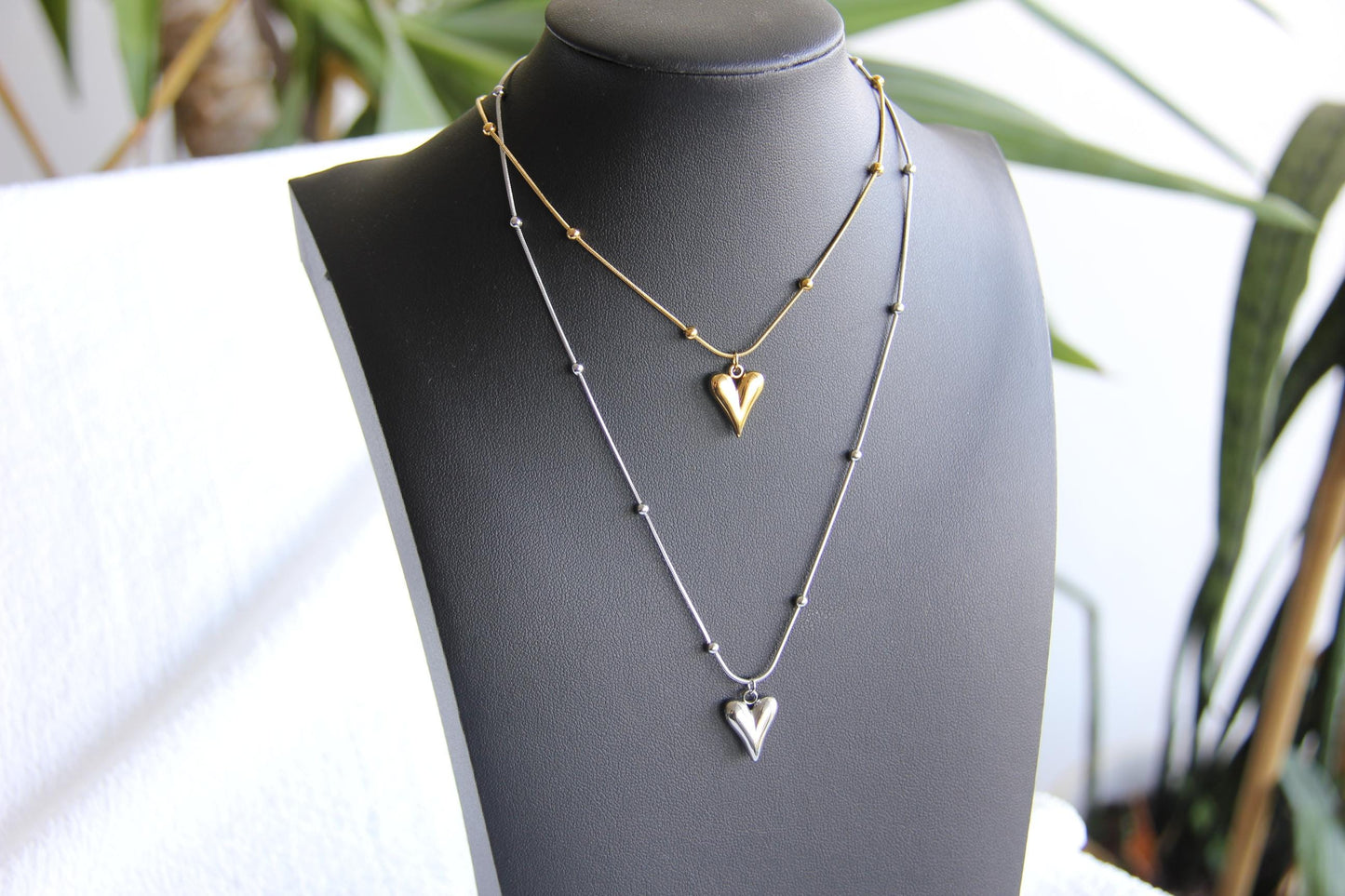 Add timeless elegance to your look with our dainty Beaded Chain Heart Pendant Charm Necklace. A perfect everyday accessory that radiates love and style!