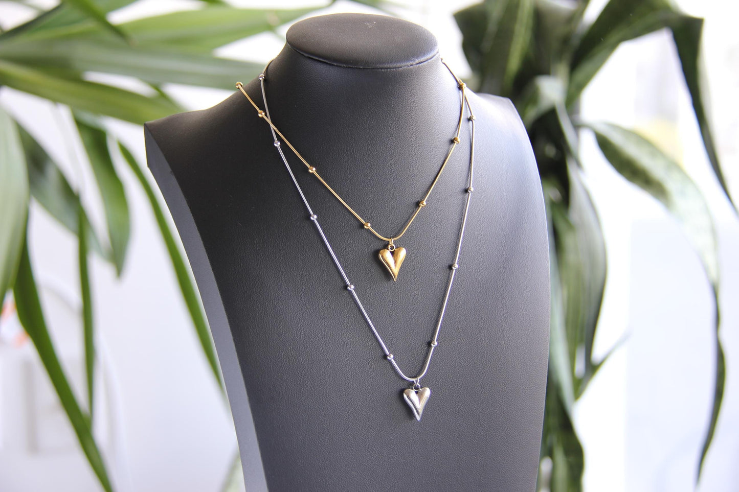 Add timeless elegance to your look with our dainty Beaded Chain Heart Pendant Charm Necklace. A perfect everyday accessory that radiates love and style!