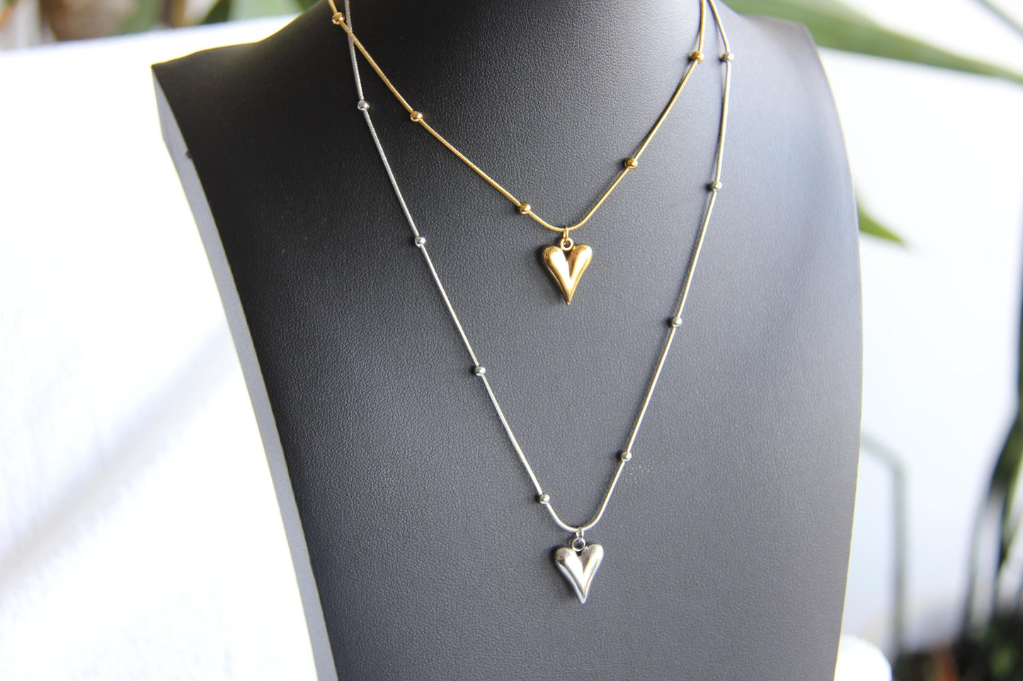 Add timeless elegance to your look with our dainty Beaded Chain Heart Pendant Charm Necklace. A perfect everyday accessory that radiates love and style!