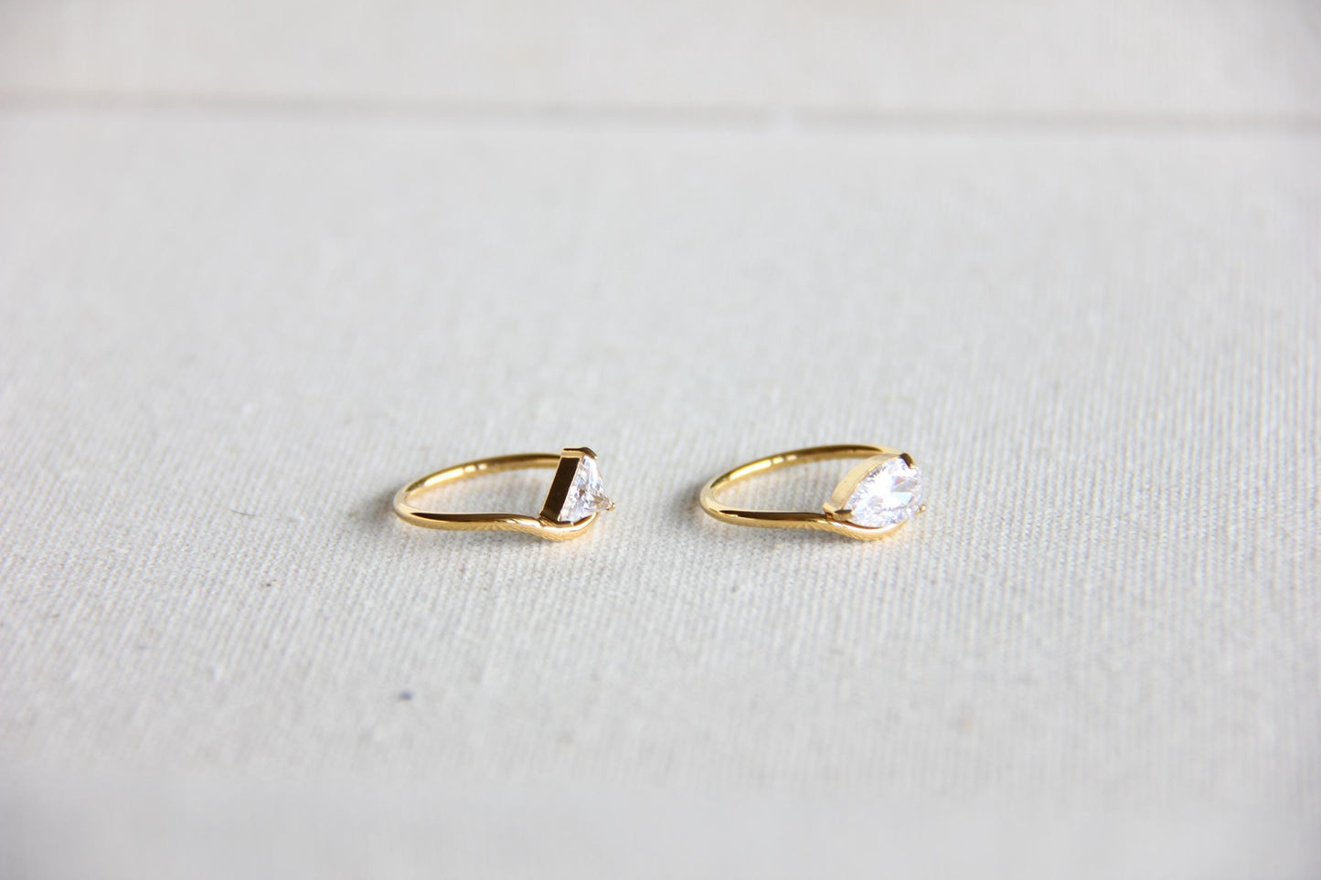 Elegant dainty zircon ring, perfect for stacking or wearing solo. Minimalist design with sparkling zircon on stainless steel band, ideal for everyday wear or gifting. Dainty waterproof gold earrings for women.