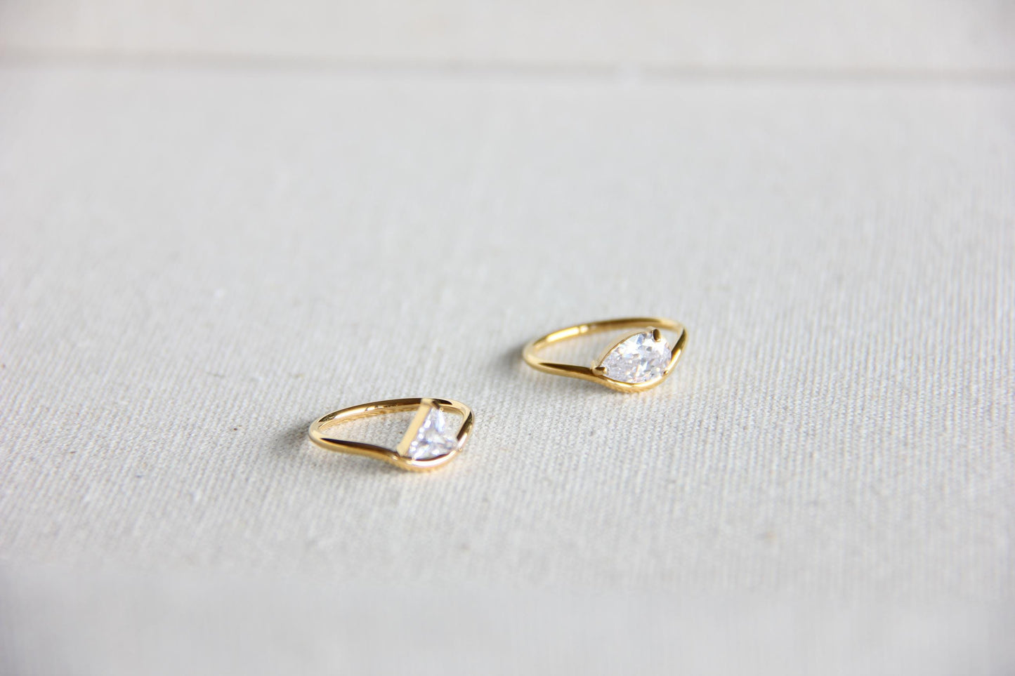 Elegant dainty zircon ring, perfect for stacking or wearing solo. Minimalist design with sparkling zircon on stainless steel band, ideal for everyday wear or gifting. Dainty waterproof gold earrings for women.