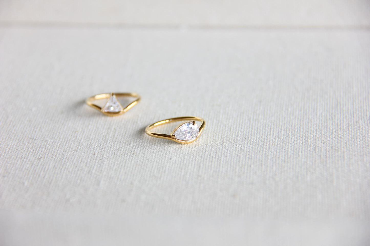Elegant dainty zircon ring, perfect for stacking or wearing solo. Minimalist design with sparkling zircon on stainless steel band, ideal for everyday wear or gifting. Dainty waterproof gold earrings for women.