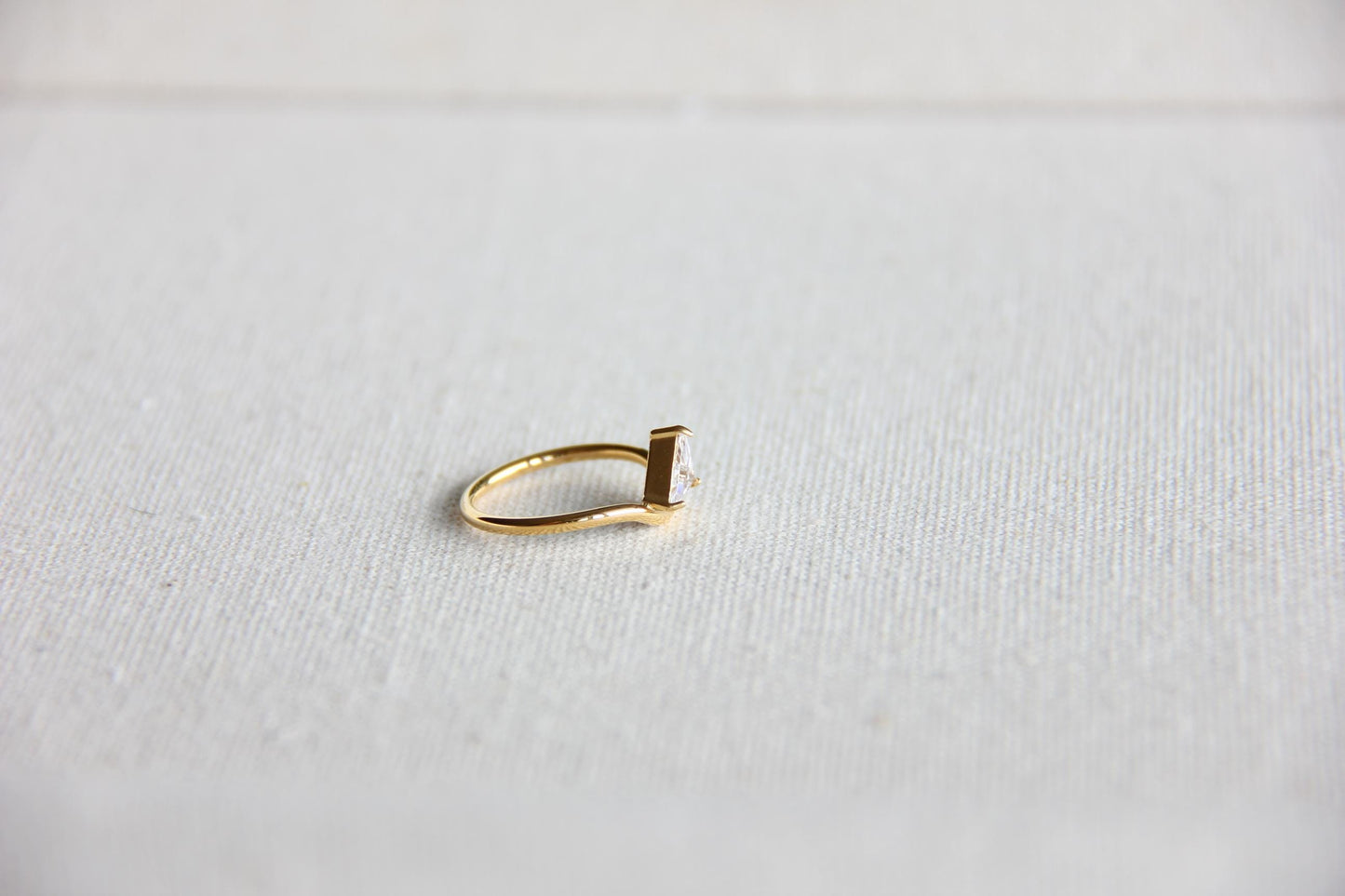 Elegant dainty zircon ring, perfect for stacking or wearing solo. Minimalist design with sparkling zircon on stainless steel band, ideal for everyday wear or gifting. Dainty waterproof gold earrings for women.