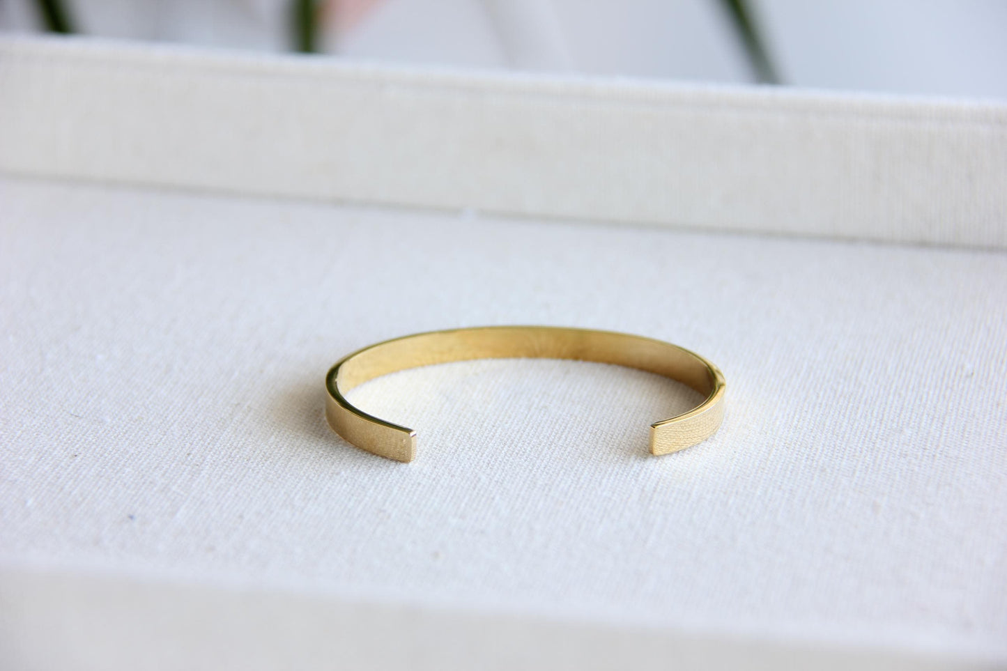 Gold and silver celestial cuff bracelet with star and moon engravings, adorned with sparkling crystals. A stylish cosmic-inspired accessory, perfect for stacking or wearing solo. Great celestial jewelry gift for women