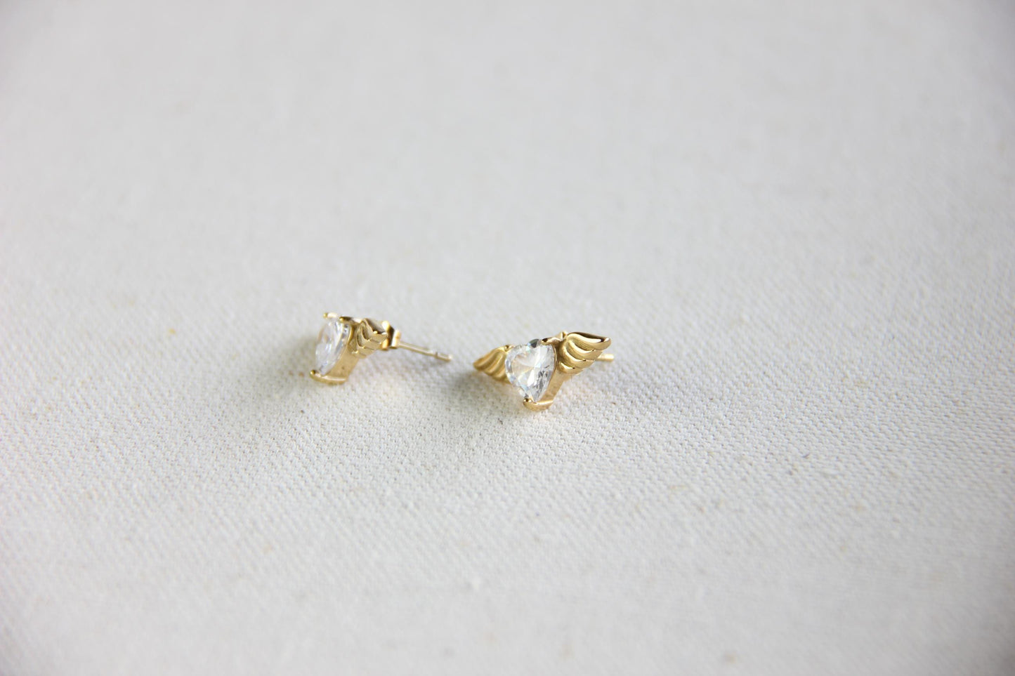 Angel wing heart stud 18K gold plated earrings , featuring a delicate and symbolic design. Dainty and lightweight earrings, perfect for everyday wear or special occasions. Guardian angel-inspired jewelry, a meaningful gift for her. Mom Gifts Ideas