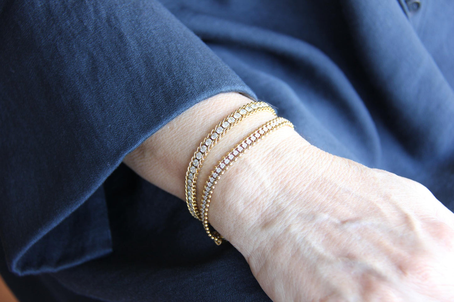 Beautiful zirconia woven gold bracelet with a touch of sparkle. Its delicate design and shimmering stones make it perfect for any outfit. Great for everyday wear, special occasions, or as a lovely gift for her.