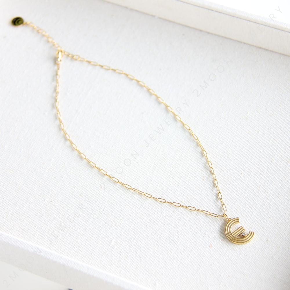 Gold initial letter necklace with a dainty pendant, perfect for personalized jewelry lovers. Elegant and minimalist custom letter necklace for everyday wear or layering. Custom letter charm necklace, a thoughtful gift for friends, bridesmaids or mom.