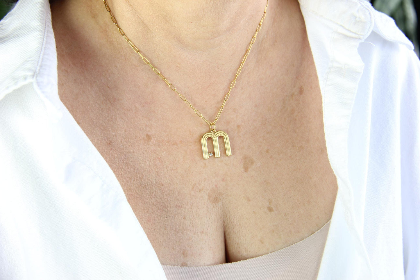 Gold initial letter necklace with a dainty pendant, perfect for personalized jewelry lovers. Elegant and minimalist custom letter necklace for everyday wear or layering. Custom letter charm necklace, a thoughtful gift for friends, bridesmaids or mom.