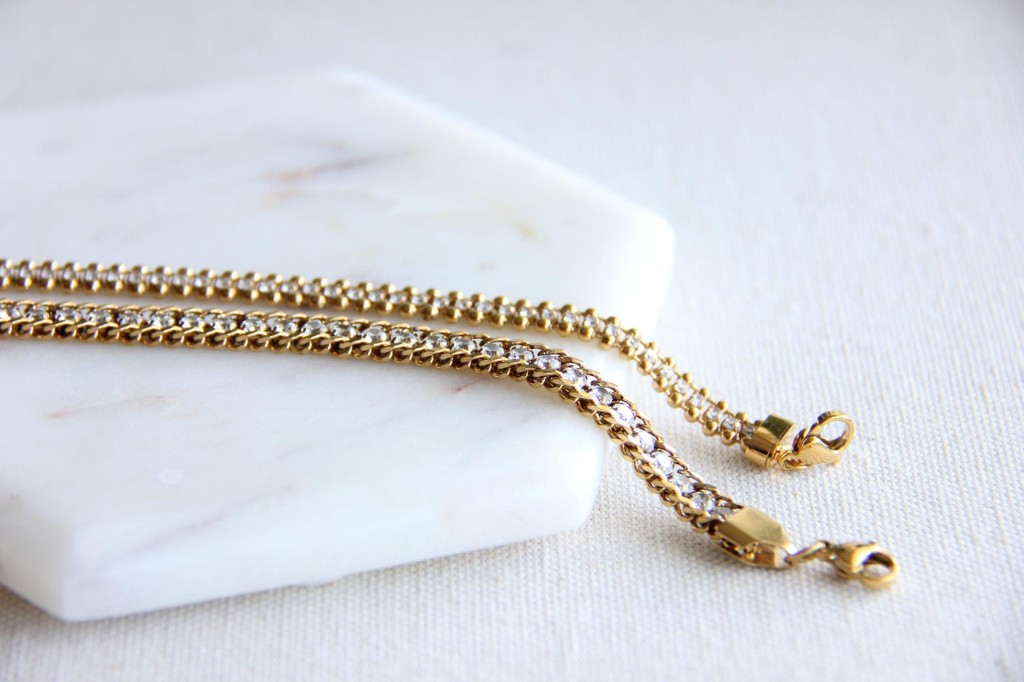Beautiful zirconia woven gold bracelet with a touch of sparkle. Its delicate design and shimmering stones make it perfect for any outfit. Great for everyday wear, special occasions, or as a lovely gift for her.