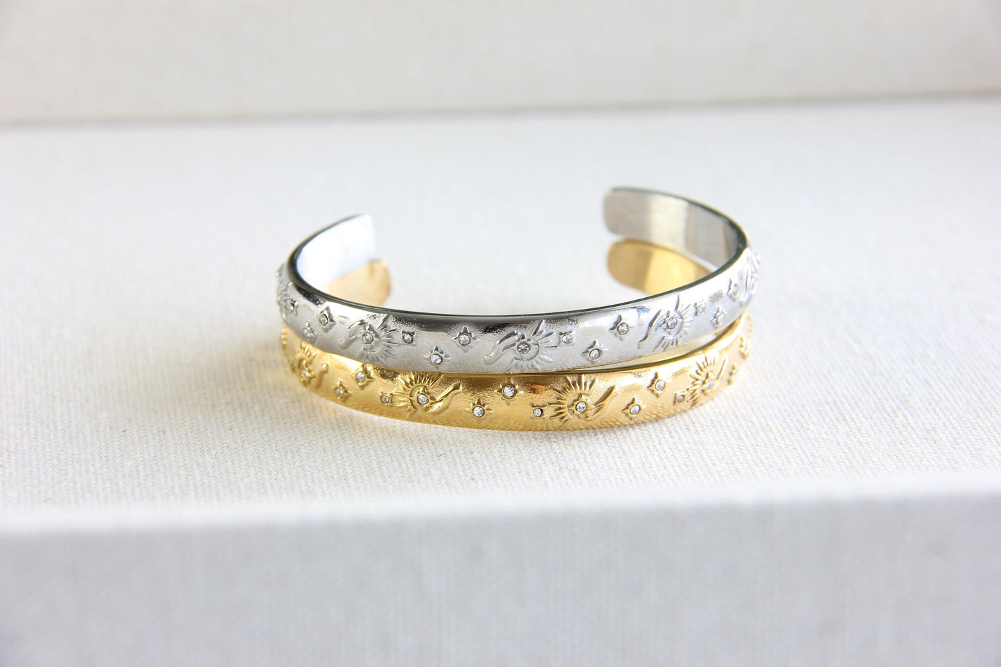Unique 18K Gold Plated Open Cuff Bangle Bracelet with colorful cubic zirconia stars that reflects both minimalist and statement textures. Complete your special occasion outfit or night style with this beauty!