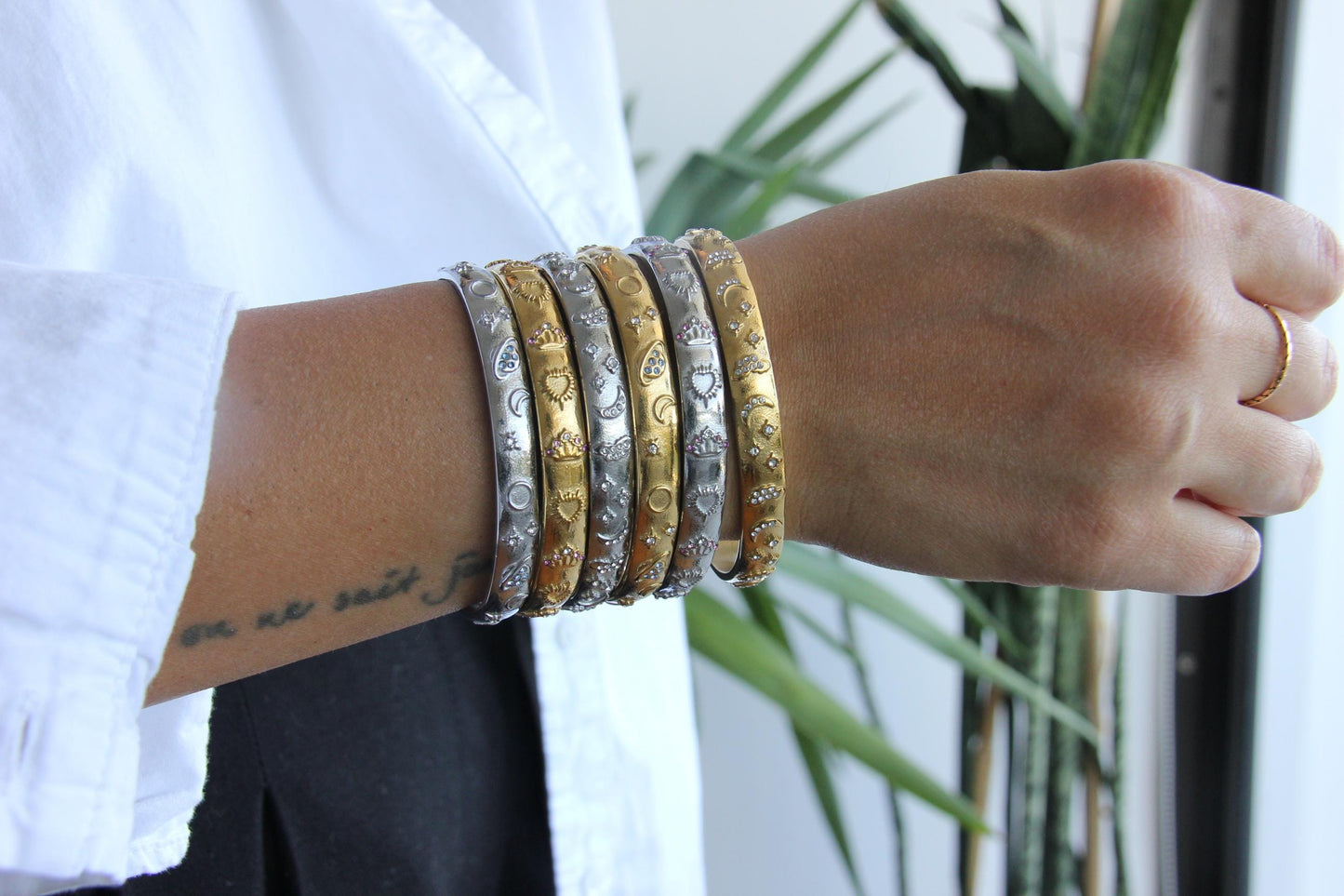 Unique 18K Gold Plated Open Cuff Bangle Bracelet with colorful cubic zirconia stars that reflects both minimalist and statement textures. Complete your special occasion outfit or night style with this beauty!