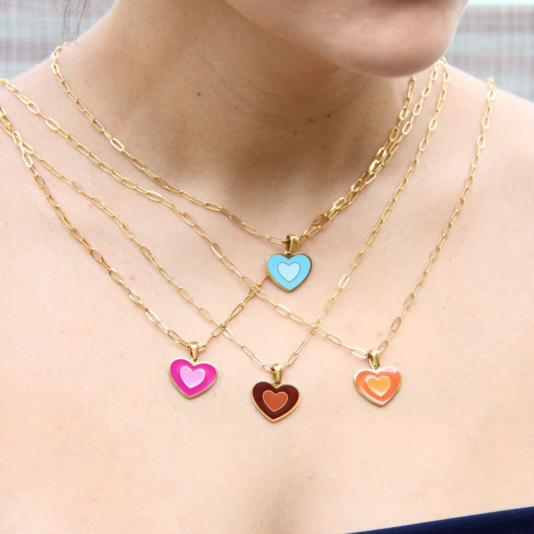 Brighten up your outfit with our Colorful Heart Pendant Chain Necklaces! Whether you&#39;re dressing up for a special event or adding a pop of color to your everyday look, this necklace offers dainty and colorful style. Perfect gift for her.