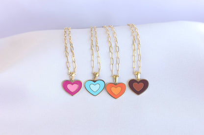 Brighten up your outfit with our Colorful Heart Pendant Chain Necklaces! Whether you&#39;re dressing up for a special event or adding a pop of color to your everyday look, this necklace offers dainty and colorful style. Perfect gift for her.