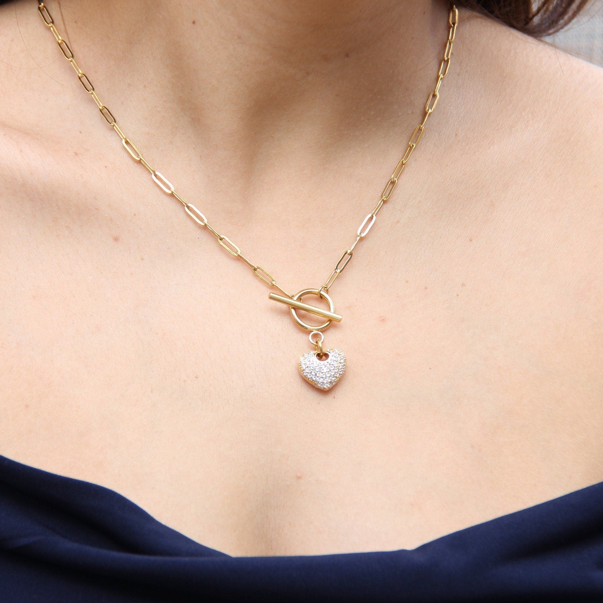 Link Chain Drop Heart Necklace reflects the beautiful harmony between one of the most popular chain type Link Chain and Cubic zirconia beaded shiny heart charm. Perfect gift for your her or for yourself!