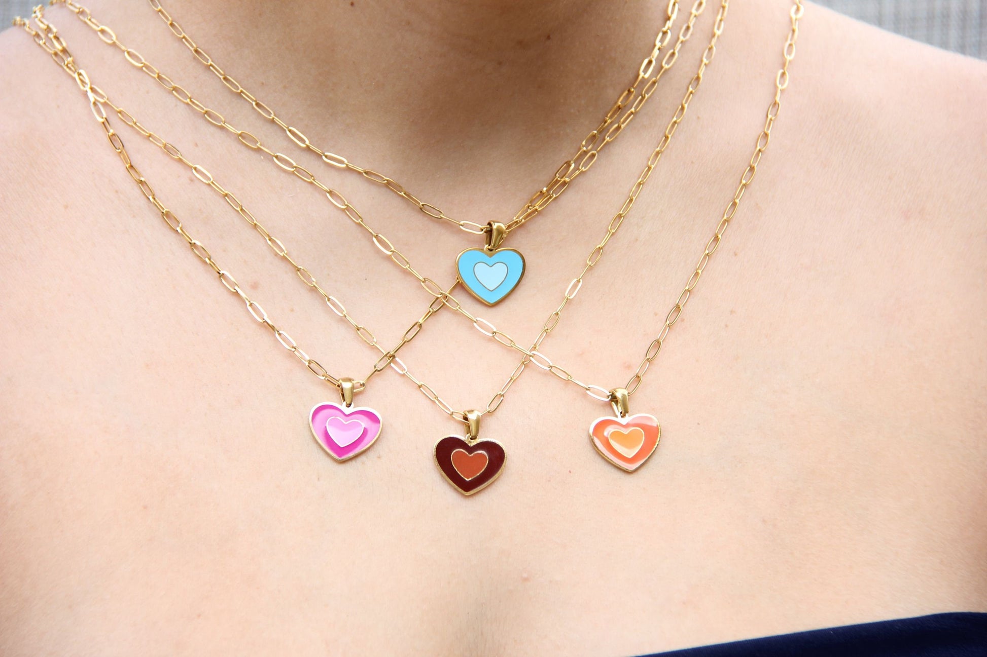 Brighten up your outfit with our Colorful Heart Pendant Chain Necklaces! Whether you&#39;re dressing up for a special event or adding a pop of color to your everyday look, this necklace offers dainty and colorful style. Perfect gift for her.