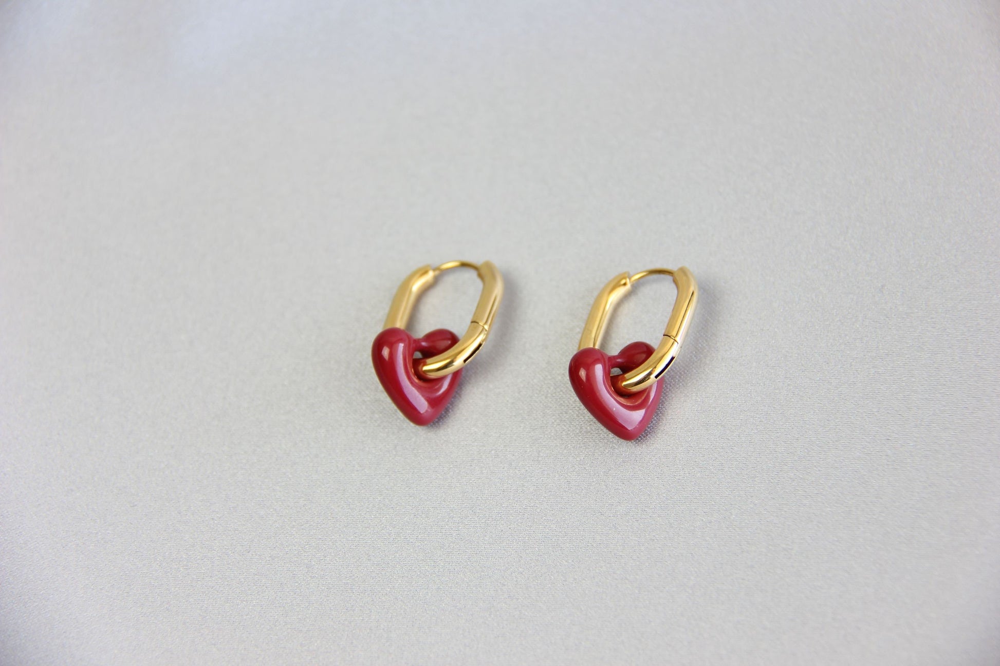 Beautiful and Dainty 18K Gold Plated Waterproof Burgundy Love Heart Drop Earrings what will go with all your other jewelry! Perfect gift for your mom, friend or loved ones!