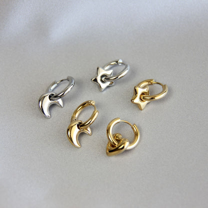 Star, Moon and Heart Pendant Gold Huggie Earrings. Mix and Match 18K gold hoop celestial earrings. Perfect gift for your loved ones.