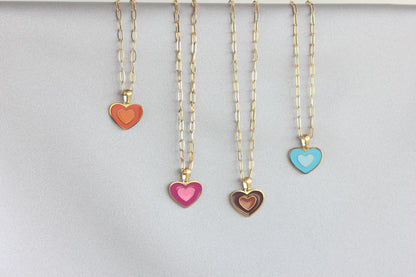 Brighten up your outfit with our Colorful Heart Pendant Chain Necklaces! Whether you&#39;re dressing up for a special event or adding a pop of color to your everyday look, this necklace offers dainty and colorful style. Perfect gift for her.