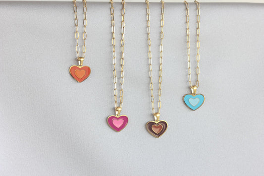 Brighten up your outfit with our Colorful Heart Pendant Chain Necklaces! Whether you&#39;re dressing up for a special event or adding a pop of color to your everyday look, this necklace offers dainty and colorful style. Perfect gift for her.