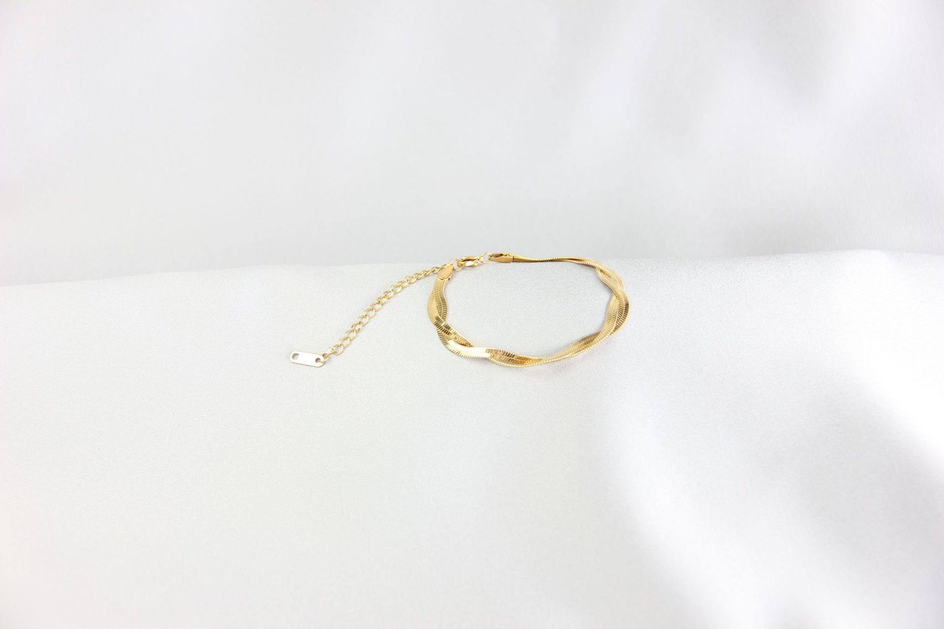 Unique Duo Color Braided Herringbone Twist Gold Chain Bracelet that reflects both minimalist and statement textures. Complete your special occasion outfit or night style with this beauty!