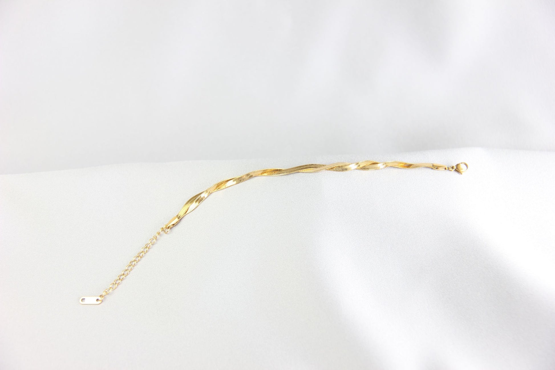 Unique Duo Color Braided Herringbone Twist Gold Chain Bracelet that reflects both minimalist and statement textures. Complete your special occasion outfit or night style with this beauty!