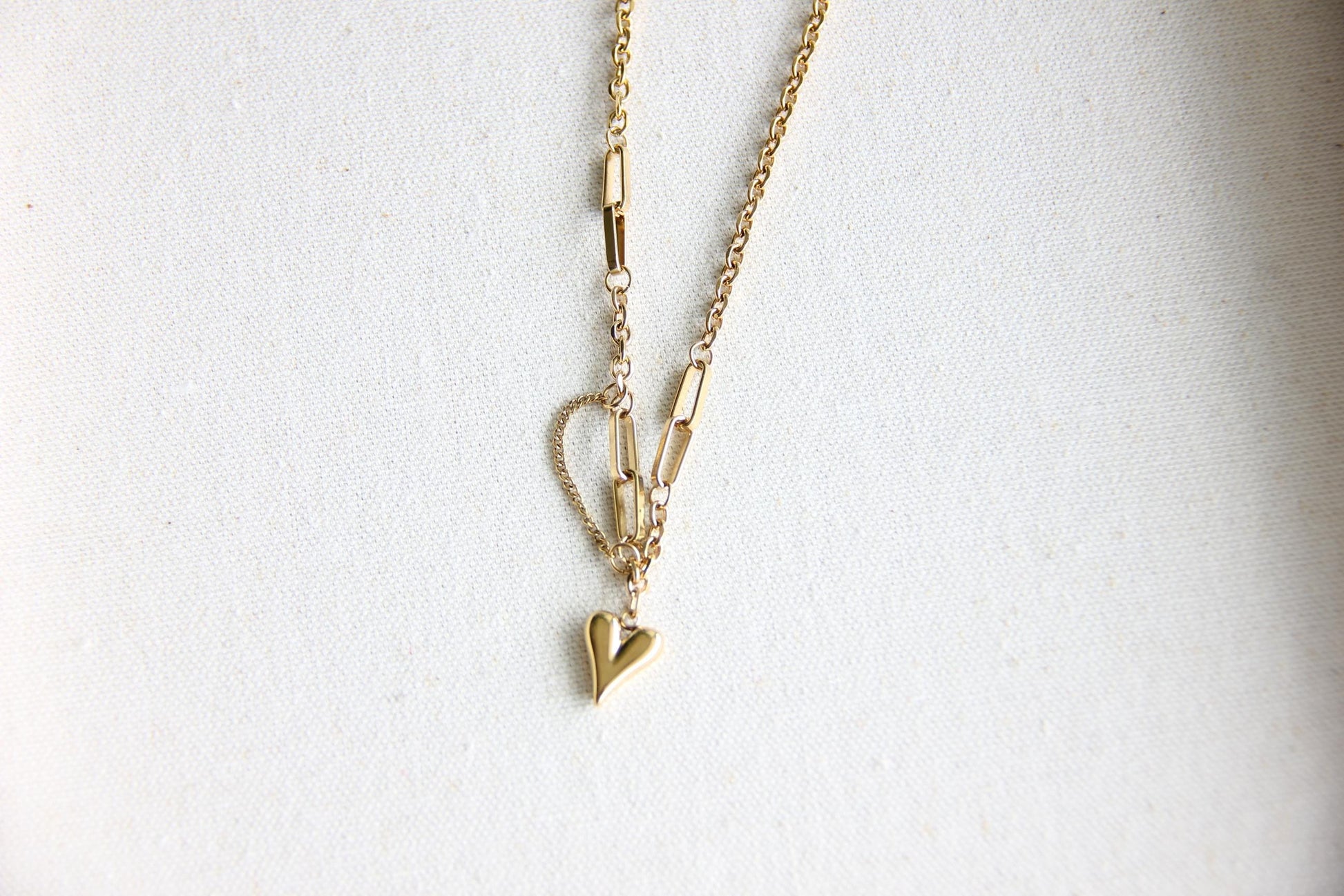 One of a kind Gold Chain Necklace with unique heart pendants. Perfect to use as a layering necklace or wearing solo, adding a touch of a romance to any outfit. Perfect gift for your wife, girlfriend, mom or for yourself!