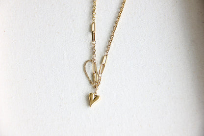 One of a kind Gold Chain Necklace with unique heart pendants. Perfect to use as a layering necklace or wearing solo, adding a touch of a romance to any outfit. Perfect gift for your wife, girlfriend, mom or for yourself!