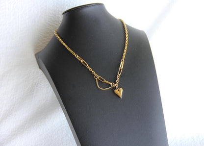 One of a kind Gold Chain Necklace with unique heart pendants. Perfect to use as a layering necklace or wearing solo, adding a touch of a romance to any outfit. Perfect gift for your wife, girlfriend, mom or for yourself!