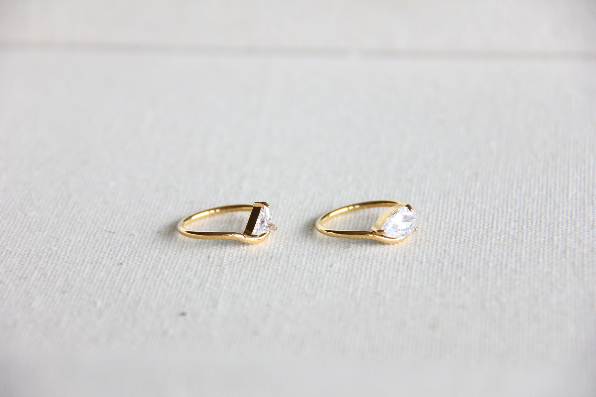 Elegant dainty zircon ring, perfect for stacking or wearing solo. Minimalist design with sparkling zircon on stainless steel band, ideal for everyday wear or gifting. Dainty waterproof gold earrings for women.
