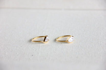 Elegant dainty zircon ring, perfect for stacking or wearing solo. Minimalist design with sparkling zircon on stainless steel band, ideal for everyday wear or gifting. Dainty waterproof gold earrings for women.