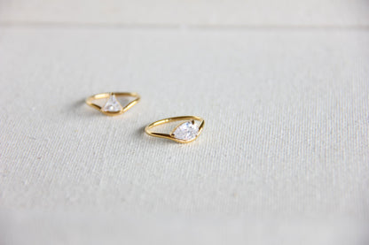 Elegant dainty zircon ring, perfect for stacking or wearing solo. Minimalist design with sparkling zircon on stainless steel band, ideal for everyday wear or gifting. Dainty waterproof gold earrings for women.