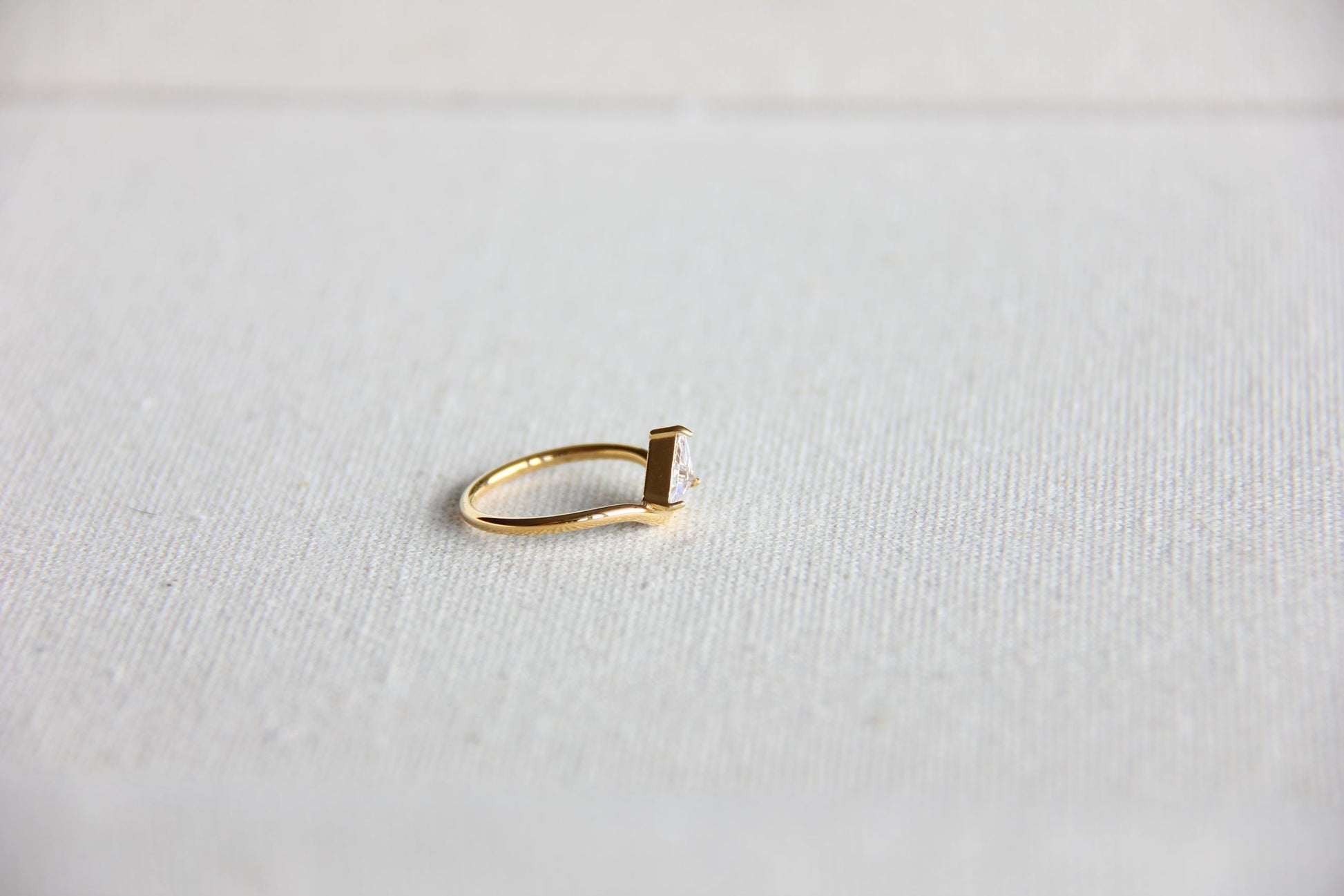 Elegant dainty zircon ring, perfect for stacking or wearing solo. Minimalist design with sparkling zircon on stainless steel band, ideal for everyday wear or gifting. Dainty waterproof gold earrings for women.