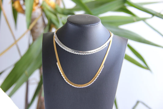 Gold snake necklace with sparkling zirconia stones, featuring a unique and minimalist design. Dainty and trendy serpent chain  statement necklace, perfect for layering or wearing solo.