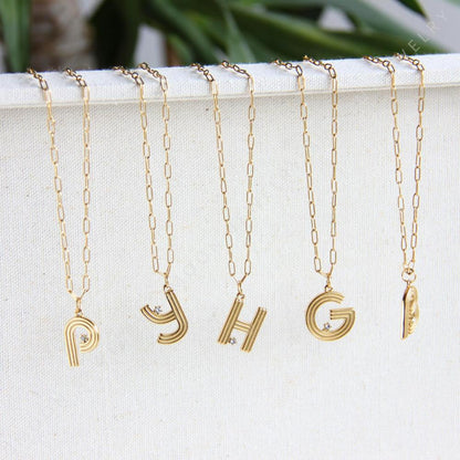 Gold initial letter necklace with a dainty pendant, perfect for personalized jewelry lovers. Elegant and minimalist custom letter necklace for everyday wear or layering. Custom letter charm necklace, a thoughtful gift for friends, bridesmaids or mom.