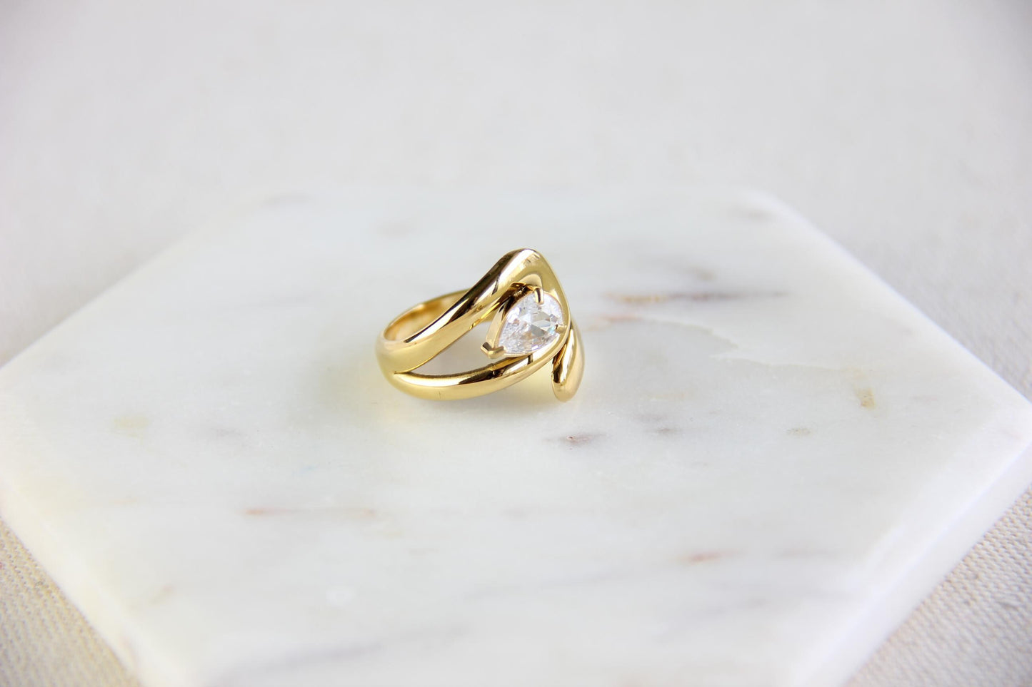 Statement gold zircon ring, perfect for stacking or wearing solo. Minimalist design with sparkling zircon on stainless steel band, ideal for everyday wear or gifting. Unique gift for friend, mom or loved ones.