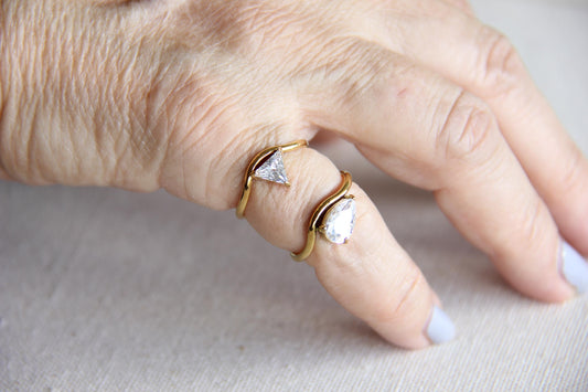 Elegant dainty zircon ring, perfect for stacking or wearing solo. Minimalist design with sparkling zircon on stainless steel band, ideal for everyday wear or gifting. Dainty waterproof gold earrings for women.