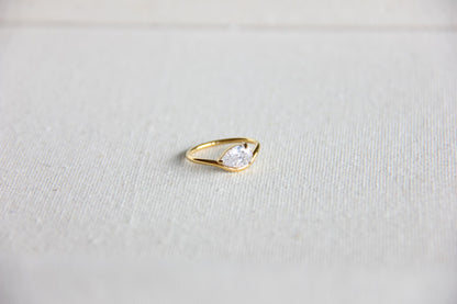 Elegant dainty zircon ring, perfect for stacking or wearing solo. Minimalist design with sparkling zircon on stainless steel band, ideal for everyday wear or gifting. Dainty waterproof gold earrings for women.