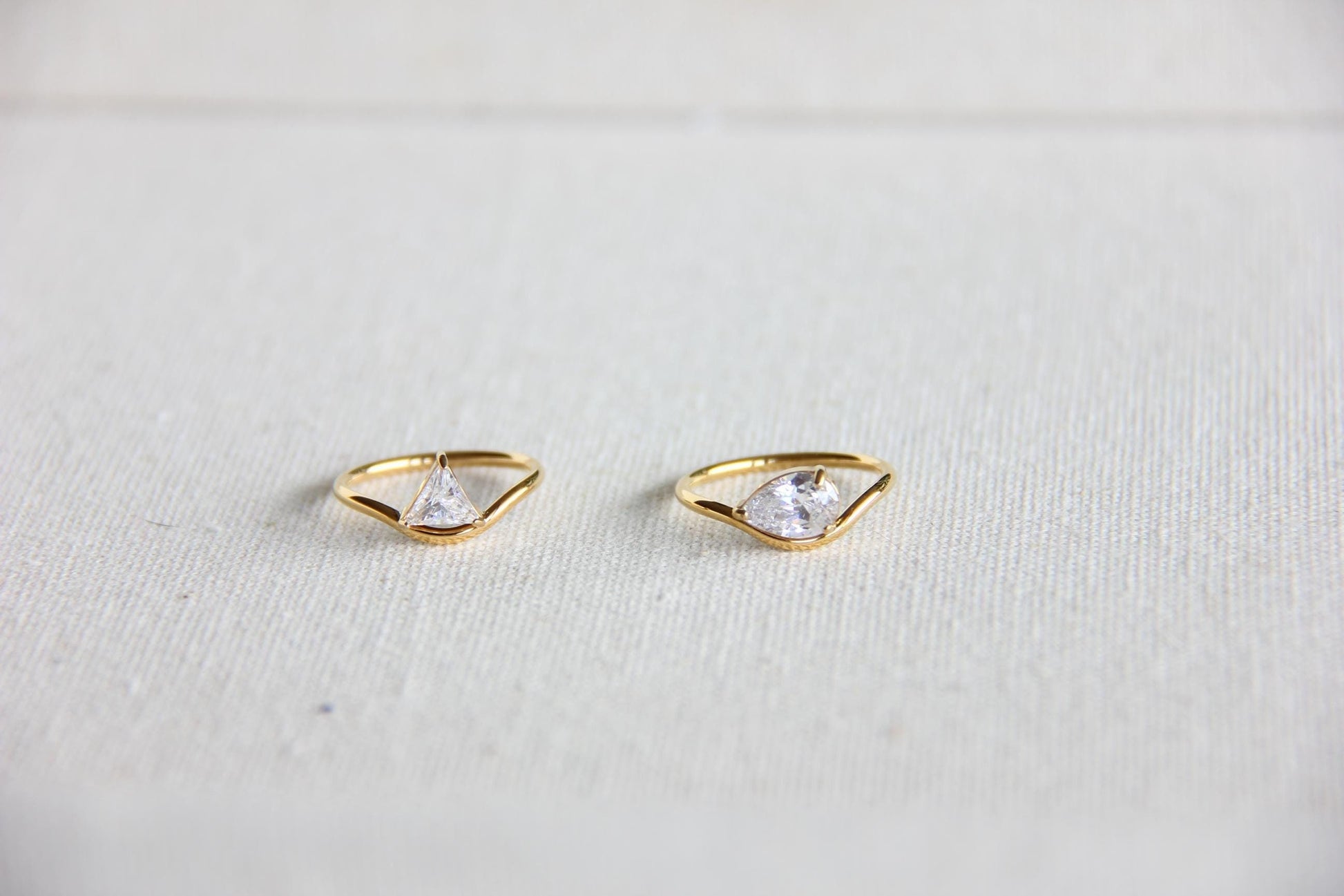 Elegant dainty zircon ring, perfect for stacking or wearing solo. Minimalist design with sparkling zircon on stainless steel band, ideal for everyday wear or gifting. Dainty waterproof gold earrings for women.