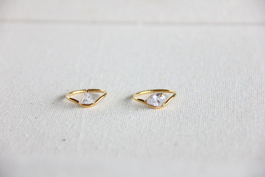 Elegant dainty zircon ring, perfect for stacking or wearing solo. Minimalist design with sparkling zircon on stainless steel band, ideal for everyday wear or gifting. Dainty waterproof gold earrings for women.