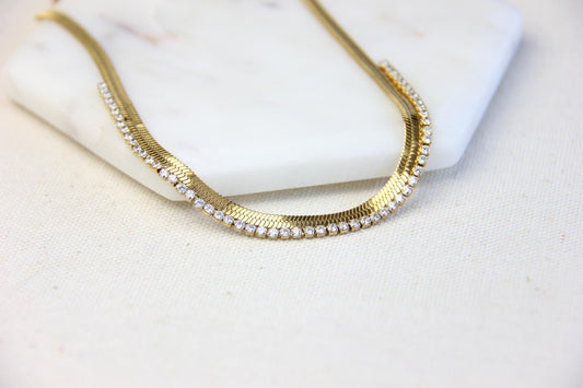 Gold snake necklace with sparkling zirconia stones, featuring a unique and minimalist design. Dainty and trendy serpent chain  statement necklace, perfect for layering or wearing solo.