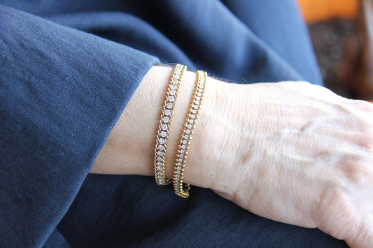 Beautiful zirconia woven gold bracelet with a touch of sparkle. Its delicate design and shimmering stones make it perfect for any outfit. Great for everyday wear, special occasions, or as a lovely gift for her.
