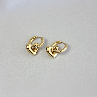 Star, Moon and Heart Pendant Gold Huggie Earrings. Mix and Match 18K gold hoop celestial earrings. Perfect gift for your loved ones.
