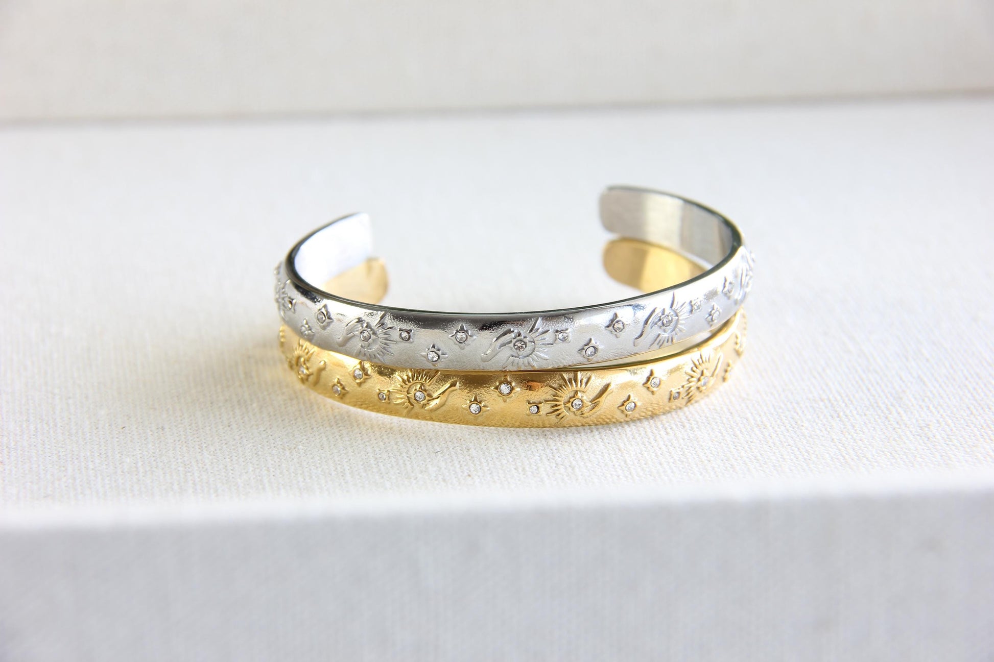 Unique 18K Gold Plated Open Cuff Bangle Bracelet with colorful cubic zirconia stars that reflects both minimalist and statement textures. Complete your special occasion outfit or night style with this beauty!